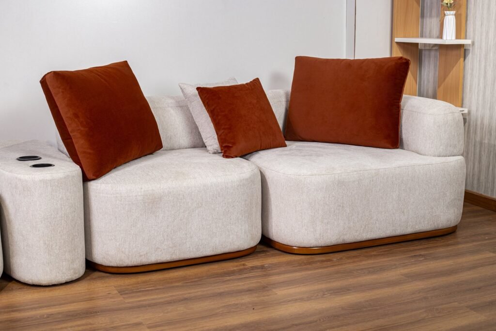 Cream Modular Living Room Set with Rust Cushions & Chair - صورة 4