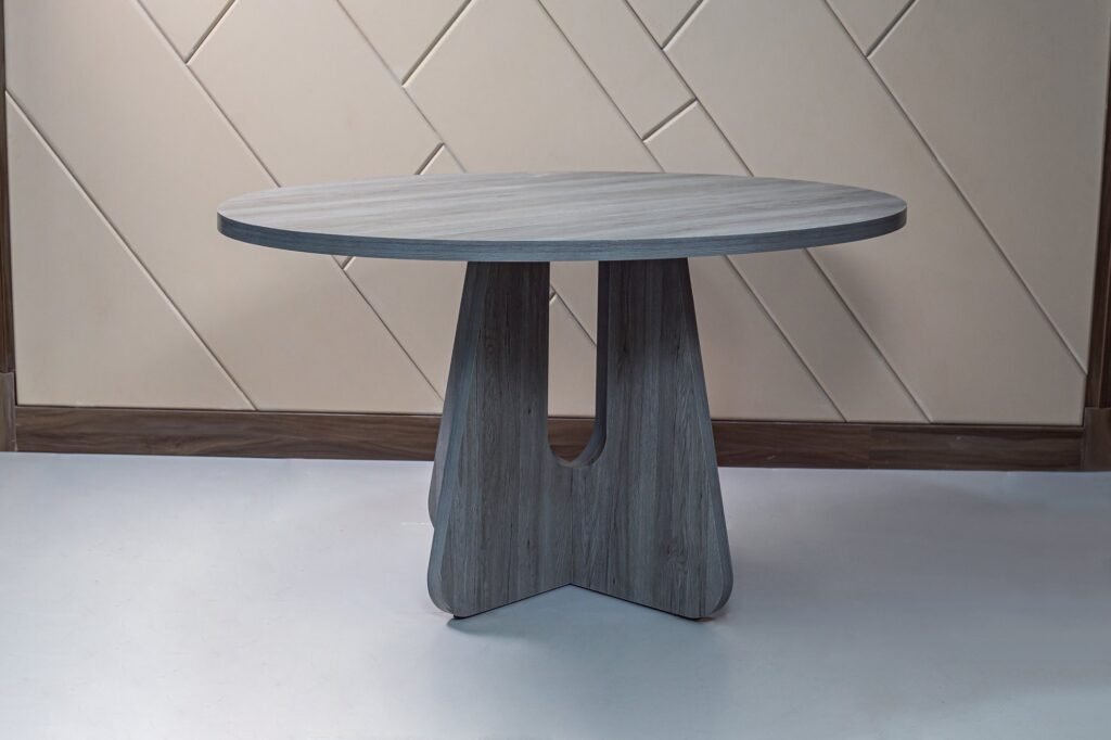 Large Grey Round Dining Table with Cut-Out Cross Base - صورة 3